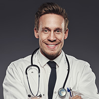 young-happy-physician-wearing-medical-white-coat-TX4ZJVF